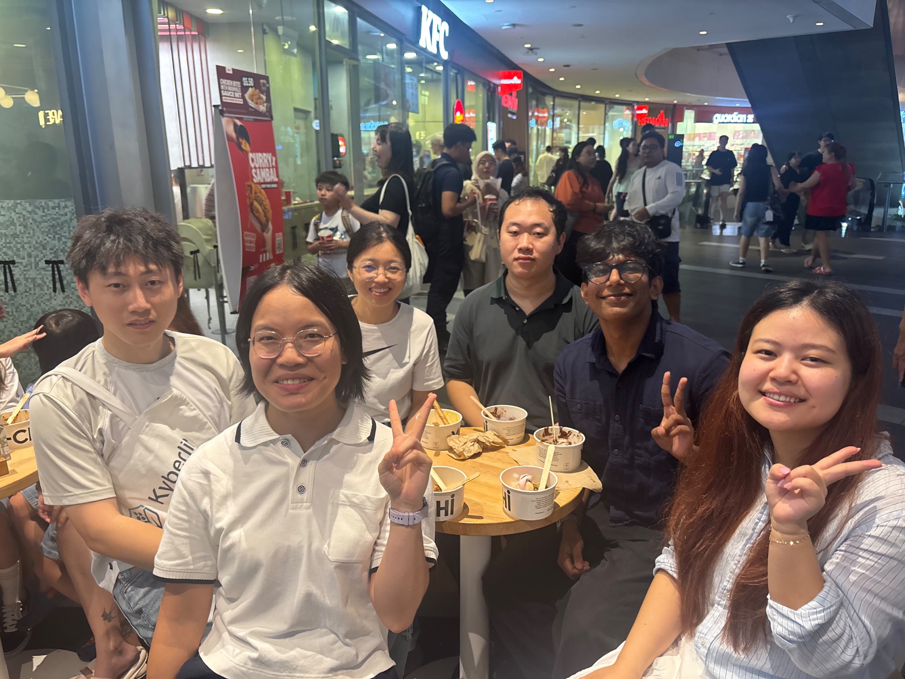 Jiao Lab members enjoying dessert together at a mall outing